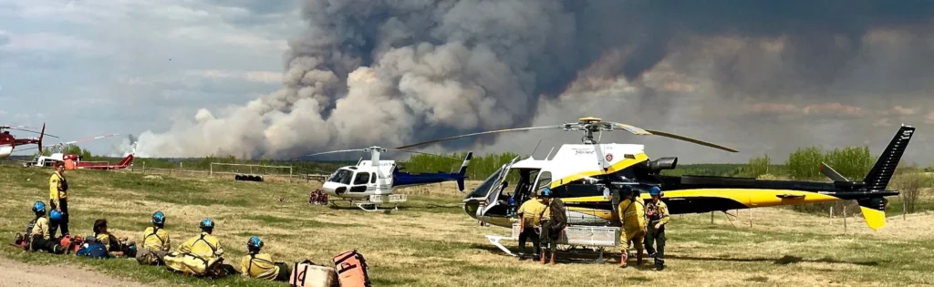 Wildfires in Canada 2018 1 Photo of landed helicopter loading wildfire fighting crews 2018