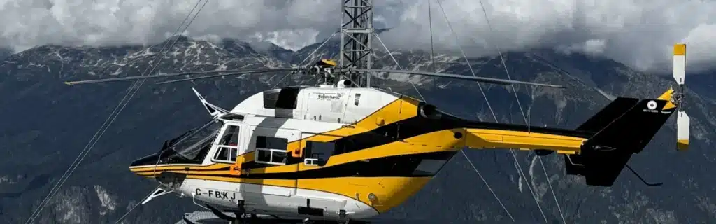 BK117 helicopter landed near cell repeater tower heli-services