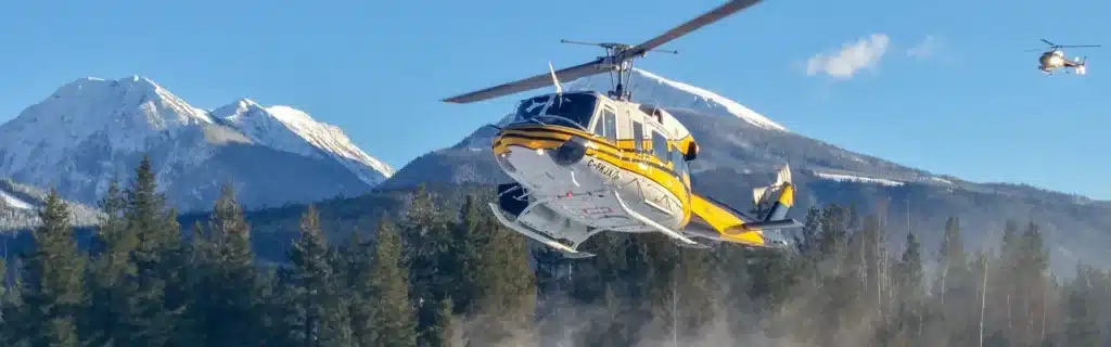 Rebuilding a Legend: Inside Our Bell 212 Refurbishment Program 7 Photo of Bell 212 FKJX about to land at heli-skiing lodge