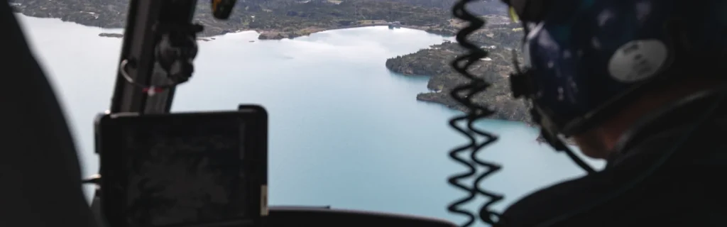 What can a helicopter do? 14 View from helicopter cockpit while flying towards a lake
